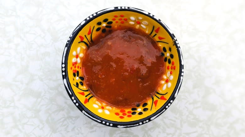 hot sauce in yellow bowl