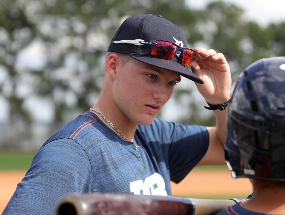 Tigers outfield prospect Parker Meadows talks with a teammate during spring training Wednesday, Feb. 20, 2019, at Joker Marchant Stadium in Lakeland, Fla.