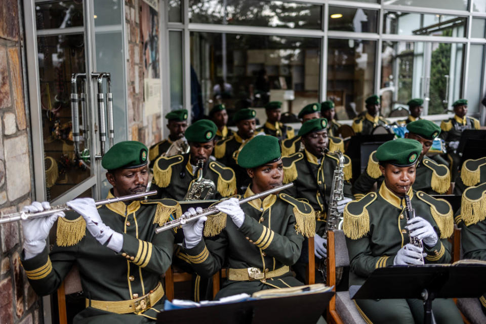 Members of the Rwandan military band play their instruments during the arrival of dignitaries to the commemorations of the 30th anniversary of the 1994 Rwandan genocide.<span class="copyright">Luis Tato—Getty Images</span>