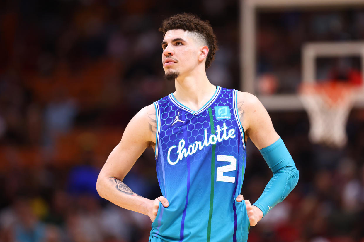 MIAMI, FLORIDA - APRIL 05: LaMelo Ball #2 of the Charlotte Hornets looks on against the Miami Heat during the second half at FTX Arena on April 05, 2022 in Miami, Florida. NOTE TO USER: User expressly acknowledges and agrees that, by downloading and or using this photograph, User is consenting to the terms and conditions of the Getty Images License Agreement.  (Photo by Michael Reaves/Getty Images)
