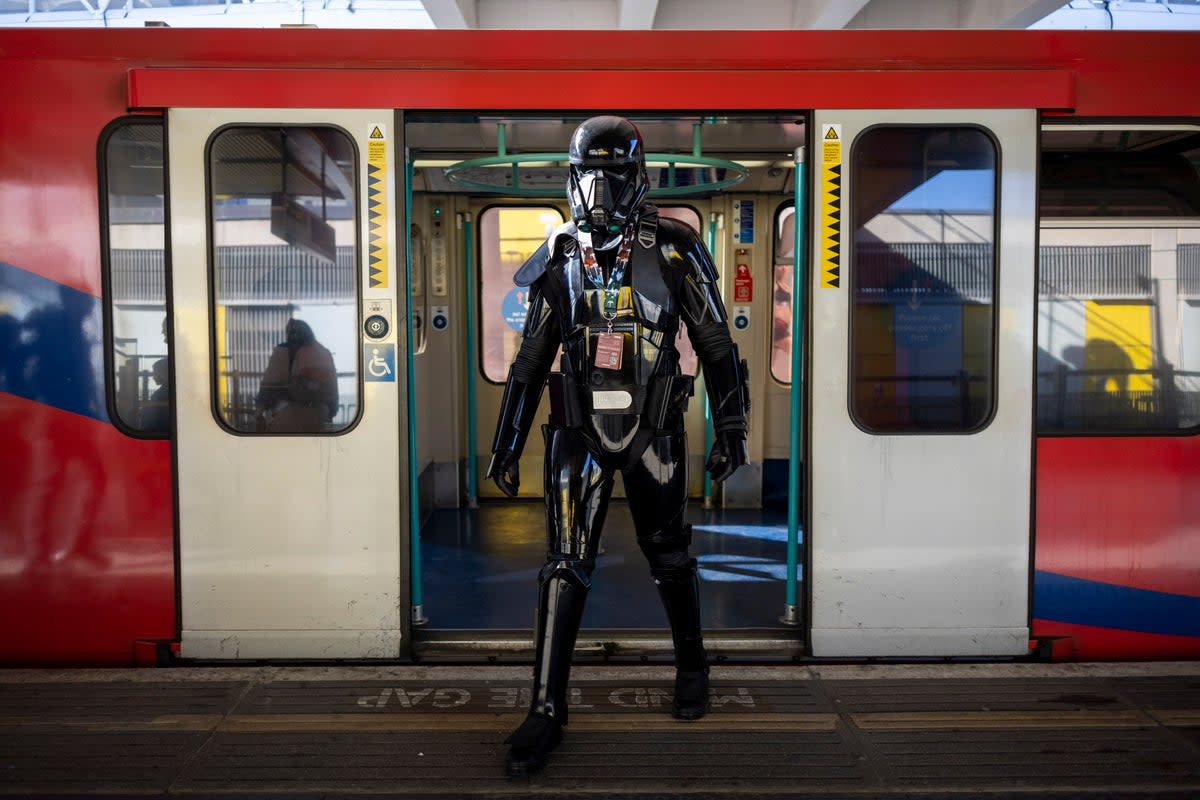 A Star Wars fan dressed as an Imperial Death Trooper arrives at ExCeL convention centre to attend Star Wars Celebration event in London (EPA)