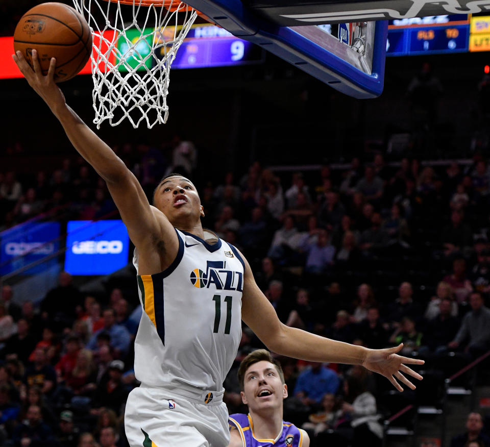 Dante Exum blocked Clippers center Boban Marjanović — who stands a full foot taller than Exum — on Thursday night in Salt Lake City. (Getty Images)