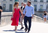 <p>Lopez flashed Affleck a sweet smile during a romantic stroll. In addition to sightseeing, the couple did some shopping at Christian Dior, <a href="https://www.vogue.com/article/jennifer-lopez-birthday-summer-style-paris" rel="nofollow noopener" target="_blank" data-ylk="slk:Vogue reports" class="link "><em>Vogue</em> reports</a>. </p>