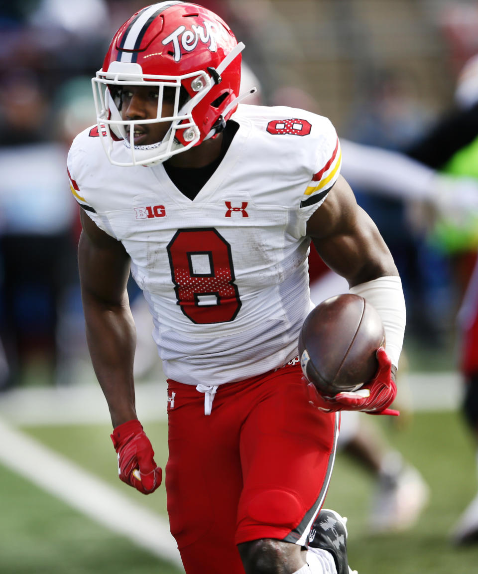 Maryland running back Tayon Fleet-Davis (8) rushes against Rutgers during the first half of an NCAA football game, Saturday, Nov. 27, 2021, in Piscataway, N.J. (AP Photo/Noah K. Murray)