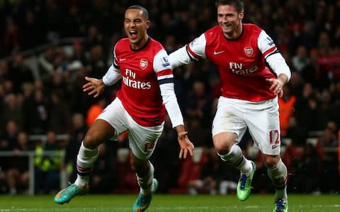 Theo Walcott celebrates scoring his hat-trick and Arsenal's seventh against Newcastle - Credit: Getty Images