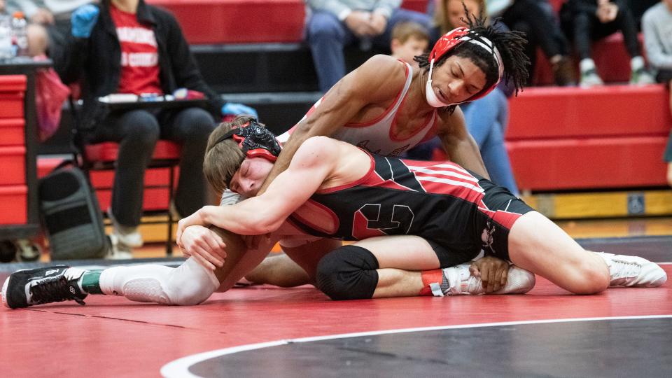 Rancocas Valley's Ismael Maldonado, top, and Cinnaminson's Dylan Vallone battle for control during the 126 lb. bout of  the 6th Annual Wrestling for Heroes Match held at Cinnaminson High School on Wednesday, January 25, 2023.  Maldonado defeated Vallone, 5-3.  