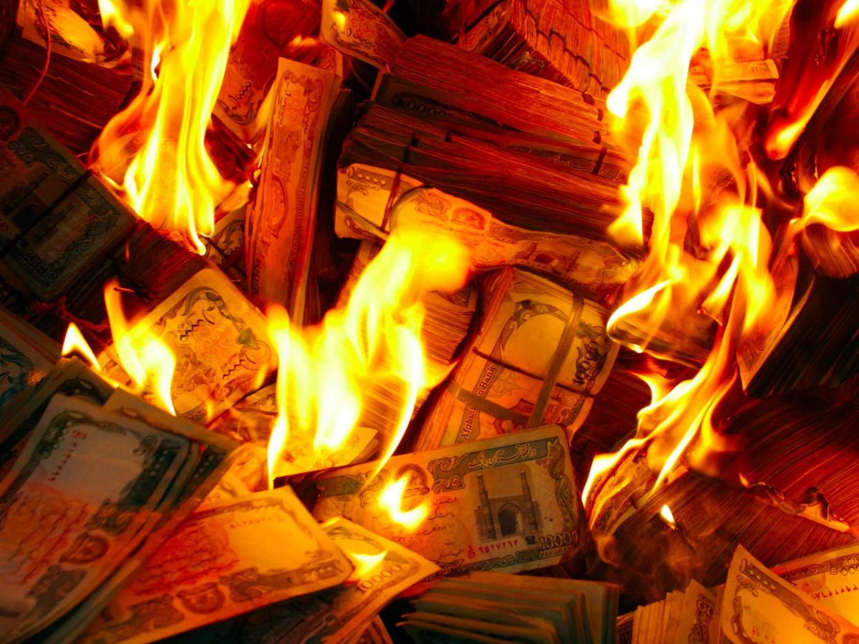 burning money cash fire flames theft stealing stolen robbery heist hacking security crime