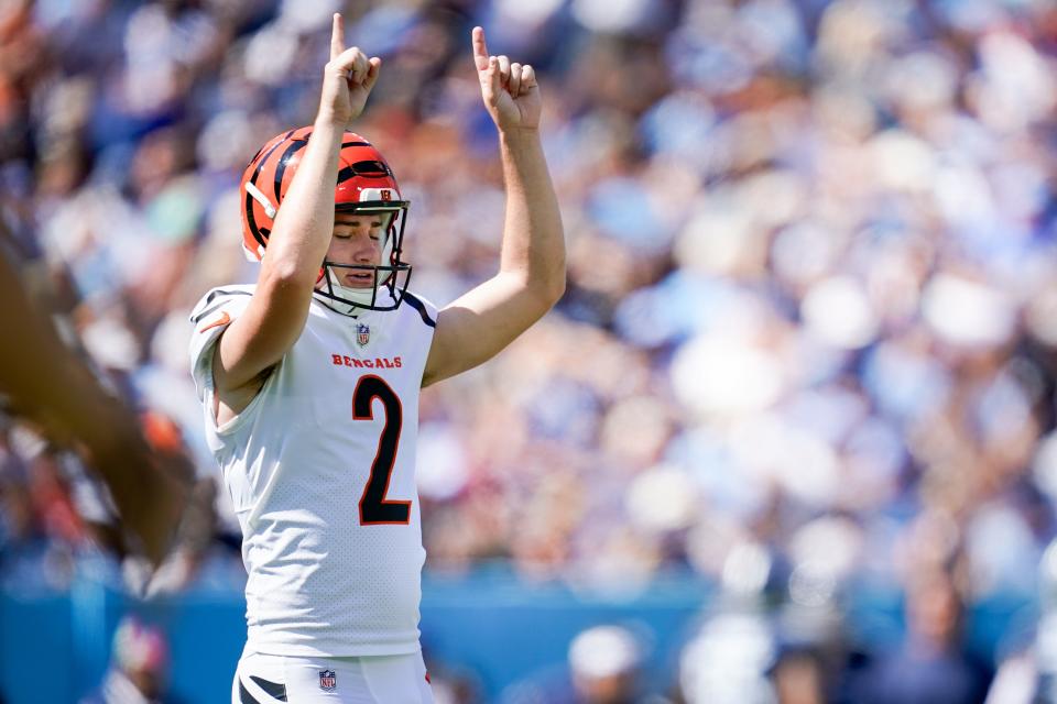 Cincinnati Bengals place kicker Evan McPherson (2) celebrates kicking a field goal against the <a class="link " href="https://sports.yahoo.com/nfl/teams/tennessee/" data-i13n="sec:content-canvas;subsec:anchor_text;elm:context_link" data-ylk="slk:Tennessee Titans;sec:content-canvas;subsec:anchor_text;elm:context_link;itc:0">Tennessee Titans</a> during the first quarter at Nissan Stadium in Nashville, Tenn., Sunday, Oct. 1, 2023.