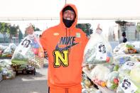 <p>Nick Cannon lends a helping hand at the Feed Your City food drive in L.A. on Saturday. </p>