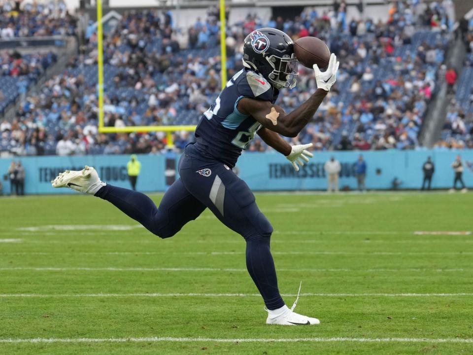 Chigoziem Okonkwo makes a catch in the end zone against the Jacksonville Jaguars.