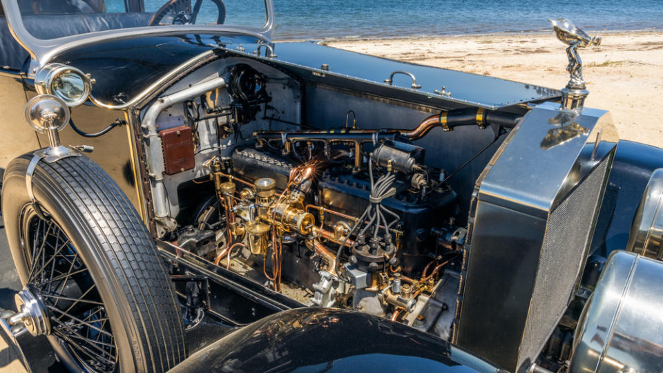 Under the hood, a 1921 engine room has plenty of brass and copper to polish. - Credit: Rolls-Royce Motor Cars NA