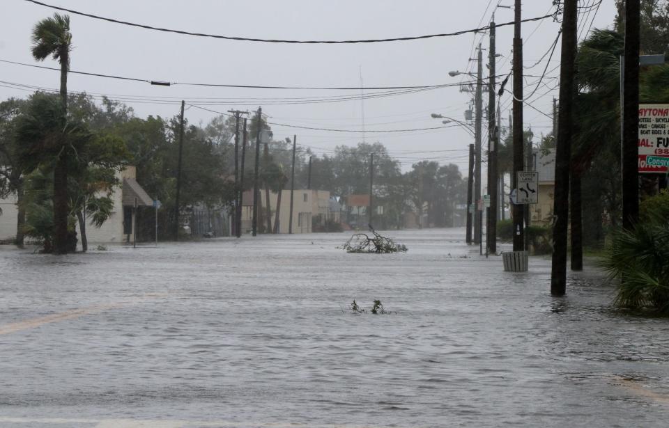 A flooded Beach Street, looking south from Seabreeze Ave. in Daytona Beach as the aftermath of Hurricane Matthew unfolds Friday,Oct. 7, 2016. News-Journal/JIM TILLER