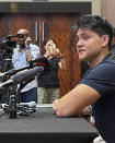 Singapore's Joseph Schooling announces his retirement from swimming at a press conference in Singapore, Tuesday, April 2, 2024. Schooling, who beat Michael Phelps in the 100-meter butterfly to win Singapore's first and only Olympic gold medal at Rio de Janeiro in 2016, announced his retirement on Tuesday. (AP Photo/Steve J. Moore)