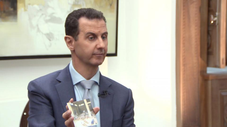 Syrian President Bashar Assad speaks about torture photos during an interview with Yahoo News. (Yahoo News Video)