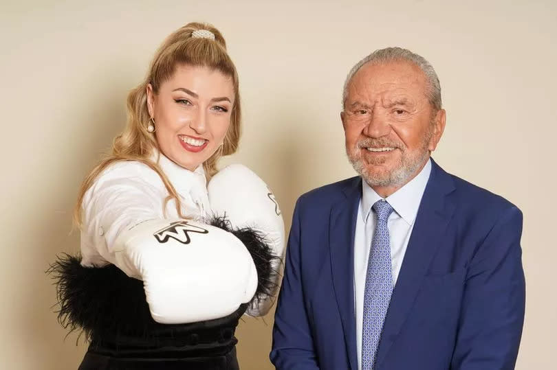 Winner of the latest series of the BBC programme The Apprentice, Marnie Swindells with Lord Sugar