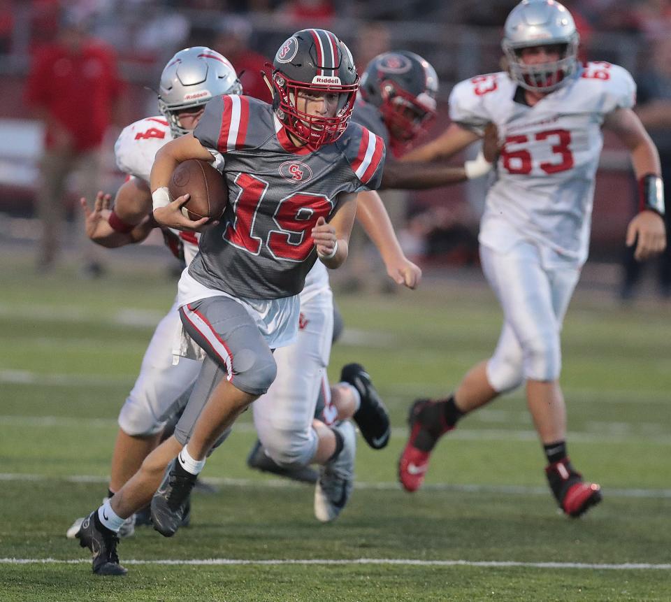 Canton South quarterback Poochie Snyder carries the ball against Sandy Valley in 2022.