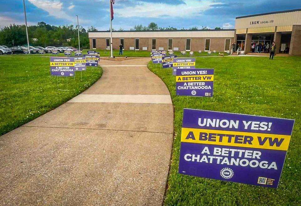 Signs in favor of the UAW union drive at the VW plant in Chattanooga line the sidewalk leading to the I.B.E.W. Local 175 where supporters gathered to watch the results.