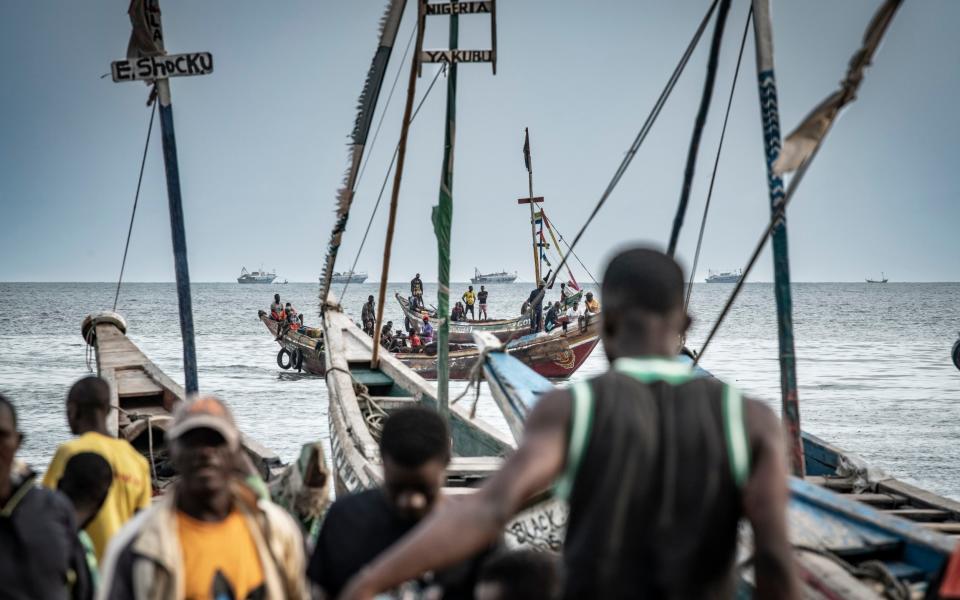 Fishermen landing their catch, Tombo Port, Sierra Leone - Simon Townsley/The Telegraph