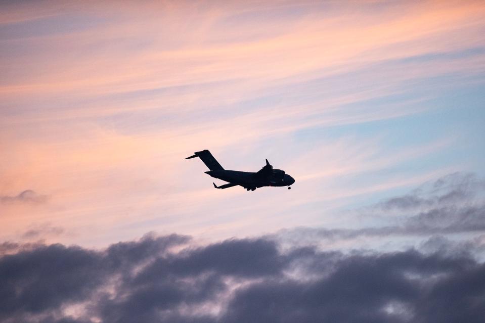 An airplane flies over Flowood, Miss., on Tuesday, Apr. 2, 2024.