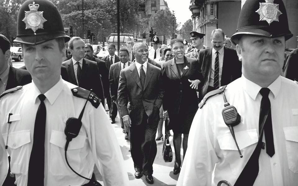 South African President Thabo Mbeki walks with Baroness Valerie Amos to Portcullis House, Westminster - Peter MacDiarmid