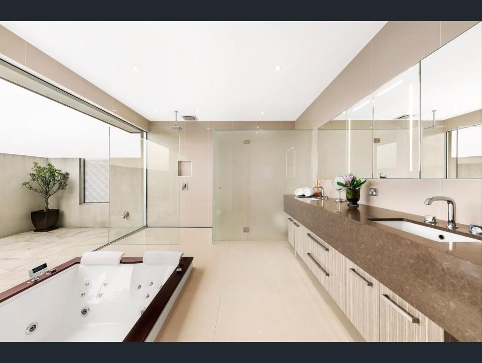 The master bedroom comes with an ensuite with a spa bath. Image: Ray White