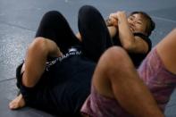 MMA fighter Angela Lee trains with her brother Christian Lee in Singapore May 18, 2017. REUTERS/Yong Teck Lim