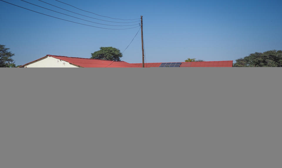 Solar panels on top of an African school