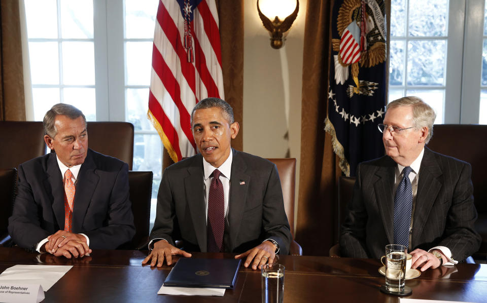 Then-President Barack Obama, center, persistently sought to find common fiscal ground with then-House Speaker John Boehner and Senate Majority Leader Mitch McConnell (R-Ky.).&nbsp; (Photo: Larry Downing / Reuters)