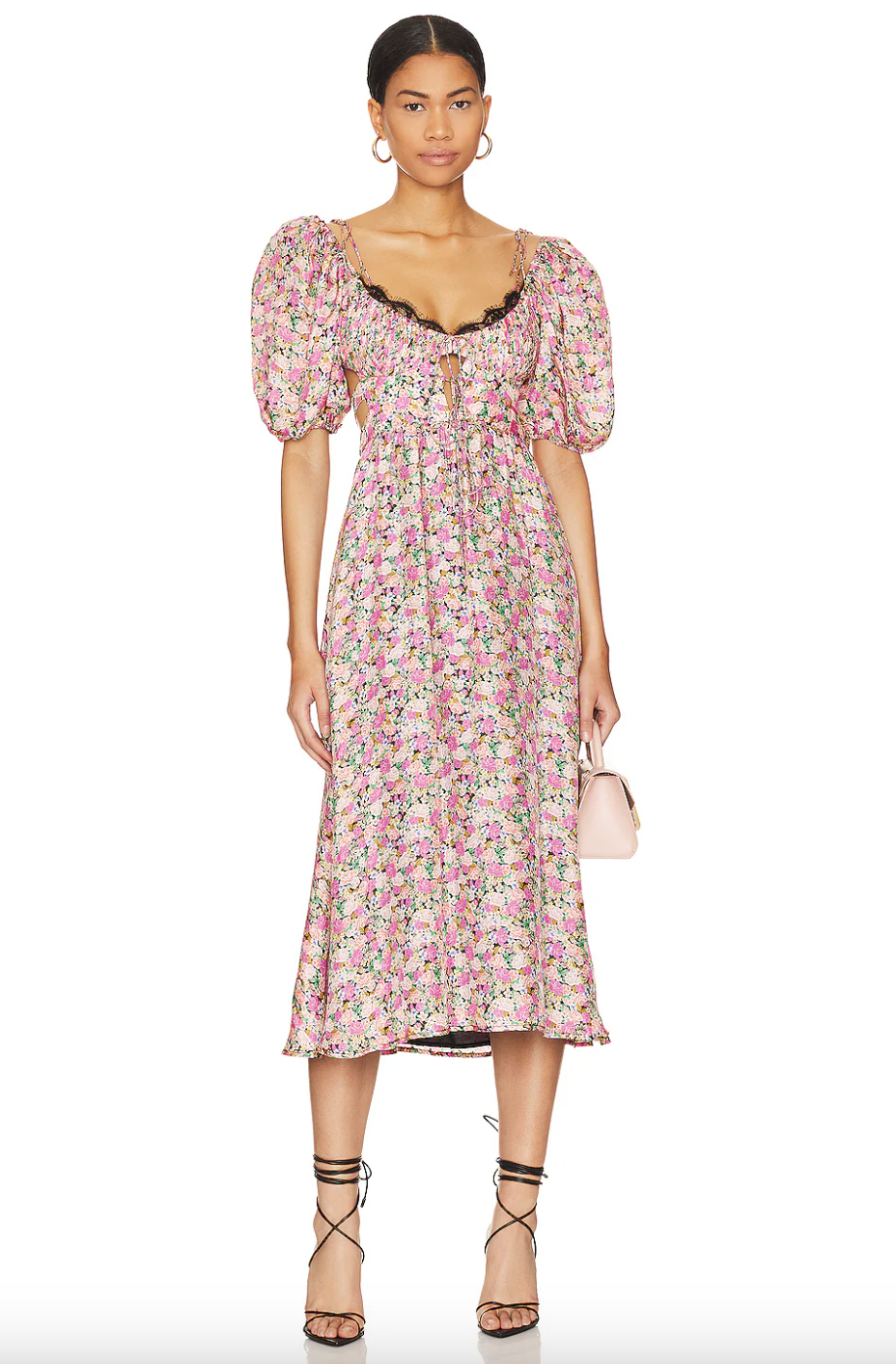 model wearing pink floral For Love & Lemons Isadora Midi Dress (photo via Revolve)