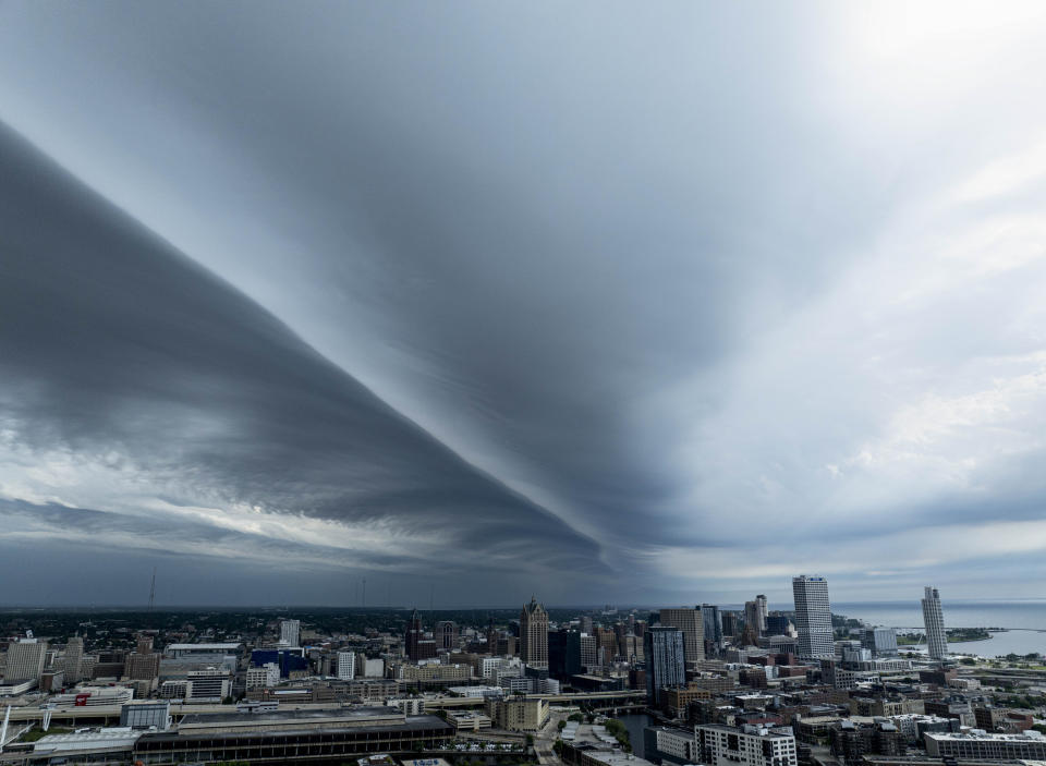 A shelf cloud moves into downtown Milwaukee, Sunday, June 16, 2024. (AP Photo/Jeffrey Phelps)