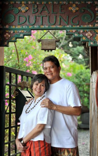 Chef and artist Claude Tayag and his wife Marry Anne pose for a portrait in their house on Angeles, Pampanga, north of Manila. Tayag sees himself as a food missionary, hoping to convert people at home and abroad to the secret cuisine wonders of the Philippines