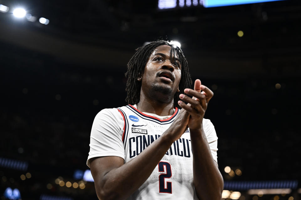 BOSTON, MASSACHUSETTS - MARCH 28: Tristen Newton #2 of the Connecticut Huskies claps in between play against the San Diego State Aztecs during the first half of the Sweet Sixteen round of the 2024 NCAA Men's Basketball Tournament held at TD Garden on March 28, 2024 in Boston, Massachusetts. (Photo by Brett Wilhelm/NCAA Photos via Getty Images)