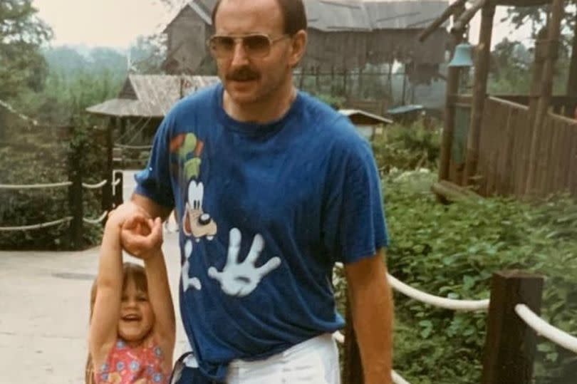 Lizzie with her father when she was younger. -Credit:Collect/PA Real Life