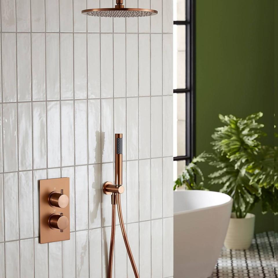 <p>'Swap colourful walls or elaborate wallpaper for natural wood cladding, clean walls, or neutral <a href="https://www.housebeautiful.com/uk/decorate/bathroom/g38915455/bathroom-tile-ideas/" rel="nofollow noopener" target="_blank" data-ylk="slk:tiles;elm:context_link;itc:0;sec:content-canvas" class="link ">tiles</a>,' says Richard. 'White, a colour that has long been associated with wellness, should also dominate the room, in both the fittings and decoration.' </p><p>If you don't want anything too stark or clinical, there are certain design features you can look out for – here, the addition of copper offers a warming element.</p><p>Pictured: <a href="https://www.homebase.co.uk/house-beautiful-aurelia-kingfisher-ceramic-wall-tile-75-x-300mm-0.5sqm-pack/13220568.html" rel="nofollow noopener" target="_blank" data-ylk="slk:House Beautiful Aurelia Cotton Ceramic Wall Tile at Homebase;elm:context_link;itc:0;sec:content-canvas" class="link ">House Beautiful Aurelia Cotton Ceramic Wall Tile at Homebase</a></p>