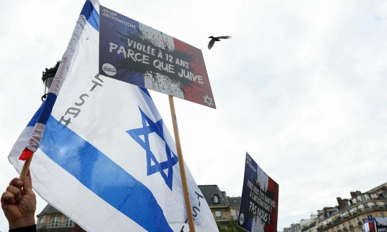 <span>Protesters at Paris city hall square after the alleged rape of a 12-year-old girl in a suspected antisemitic attack, a case that has shocked France.</span><span>Photograph: Alain Jocard/AFP/Getty Images</span>