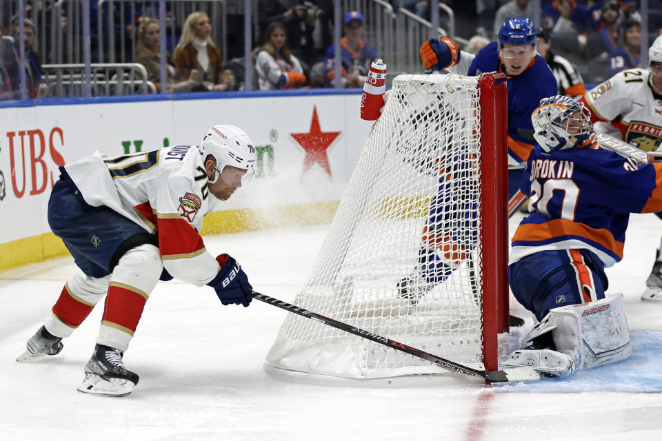 Florida Panthers right wing Patric Hornqvist (70) scores a goal past New York Islanders goaltender Ilya Sorokin during the third period of an NHL hockey game Thursday, Oct. 13, 2022, in Elmont, N.Y. (AP Photo/Adam Hunger)