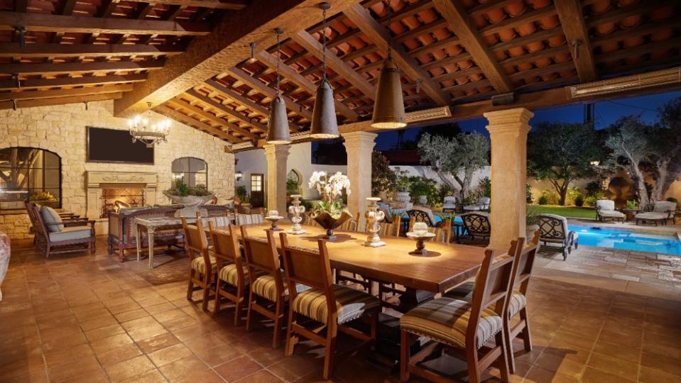 The estancia features an outdoor dining area and fire pit. - Credit: John Leonffu