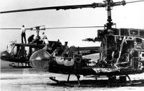 CLARIFICATION IN THE SECOND SENTENCE - FILE - Two West German border police helicopters that carried armed terrorists and their nine Israeli Olympian hostages, stand at Fuerstenfeldbruck air force base, twenty miles west of Munich, Germany, on Sept. 7, 1972. The German and Israeli presidents are to join relatives of the 11 Israeli athletes killed in the attack by Palestinian militants on the 1972 Munich Olympics to mark the 50th anniversary. (AP Photo, File)