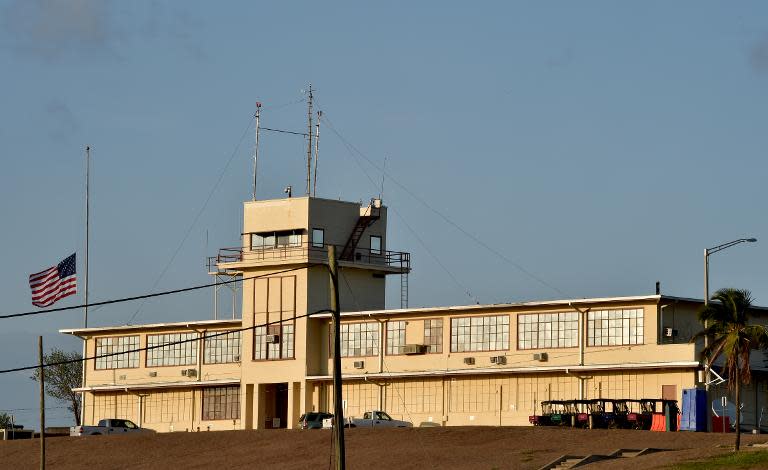 This photo made during an escorted visit and reviewed by the US military shows the old war crime courtroom in Camp Justice at the US Naval Station in Guantanamo Bay, Cuba, April 7, 2014