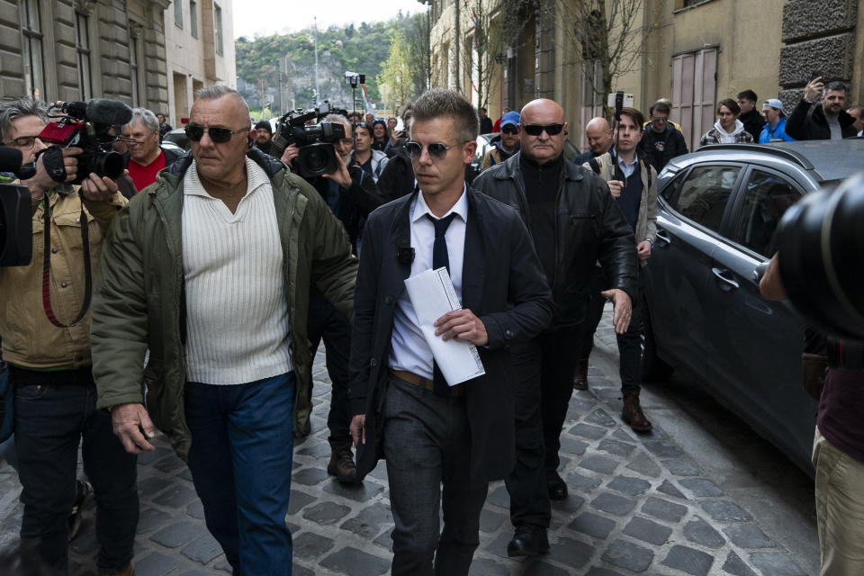 Former Hungarian government insider Peter Magyar leaves the Public Prosecutor's office in Budapest, Hungary, on Tuesday March 26, 2024. Magyar on Tuesday released a recording that he claims proves senior officials in the government of Prime Minister Viktor Orbán manipulated court documents to cover up their involvement in a corruption case. (AP Photo/Denes Erdos)