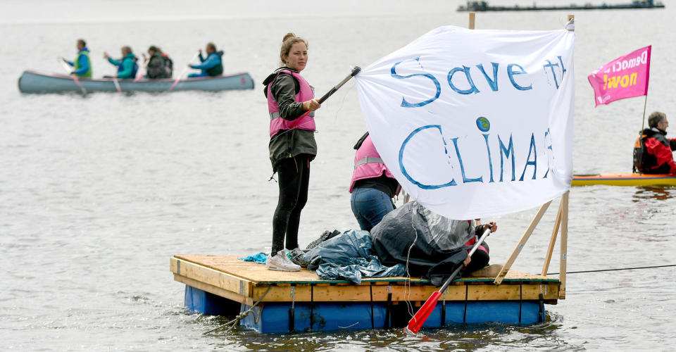 <p>Participants of the movement ‘ Compact’ take part in a protest regatta against the G20 summit in Hamburg, Germany, Sunday, July 2, 2017. The G20 summit will take place in Hamburg on July 7 and July 8, 2017. (Axel Heimken/dpa via AP) </p>