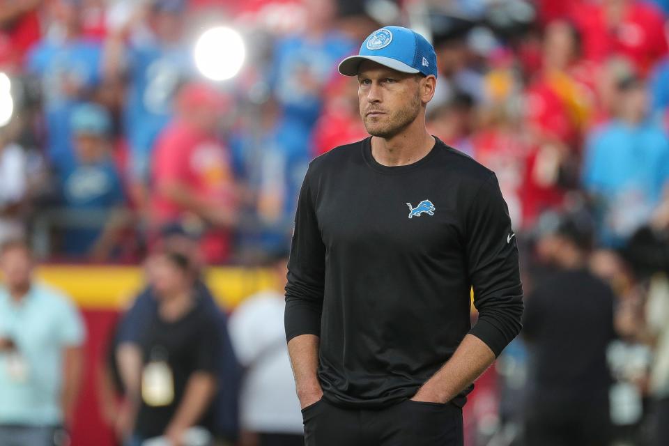 Detroit Lions offensive coordinator Ben Johnson watches warm up ahead of the season opener against the Kansas City Chiefs at Arrowhead Stadium in Kansas City, Mo. on Thursday, Sept. 7, 2023.