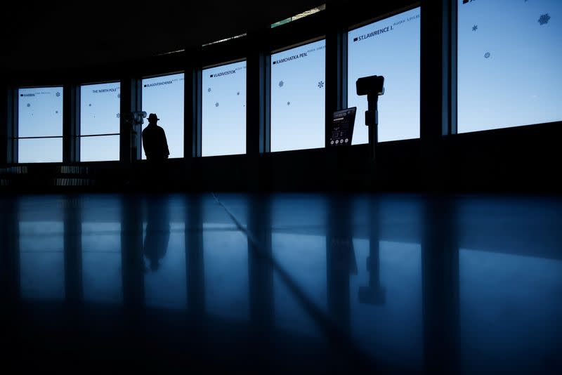 A man enjoys the view from the top of N Seoul Tower amid the coronavirus disease (COVID-19) pandemic in Seoul