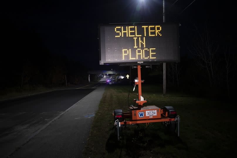 A sign signals the public to shelter in place during an active shooter situation on Wednesday, Oct. 25, 2023, in Lewiston, Maine.