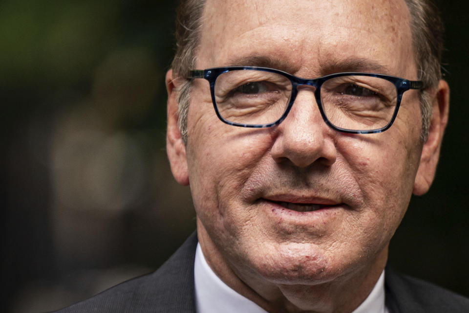 Actor Kevin Spacey looks on as he arrives at Southwark Crown Court, London, where he is charged with three counts of indecent assault, seven counts of sexual assault, one count of causing a person to engage in sexual activity without consent and one count of causing a person to engage in penetrative sexual activity without consent between 2001 and 2005, on Thursday July 13, 2023. (Aaron Chown/PA via AP)