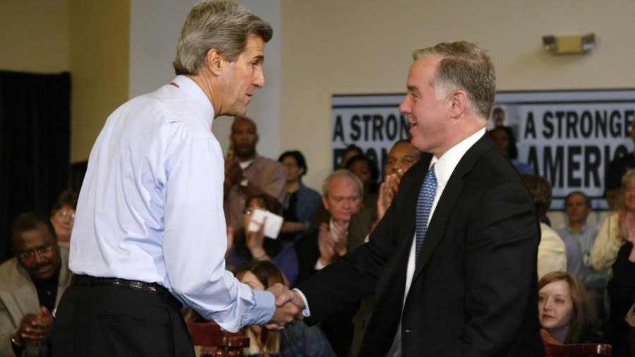 <em>John Kerry shakes hands with Howard Dean after they both spoke to people at a campaign event May 18, 2004, in Portland, Oregon.</em> (Photo by Paula Bronstein/Getty Images)