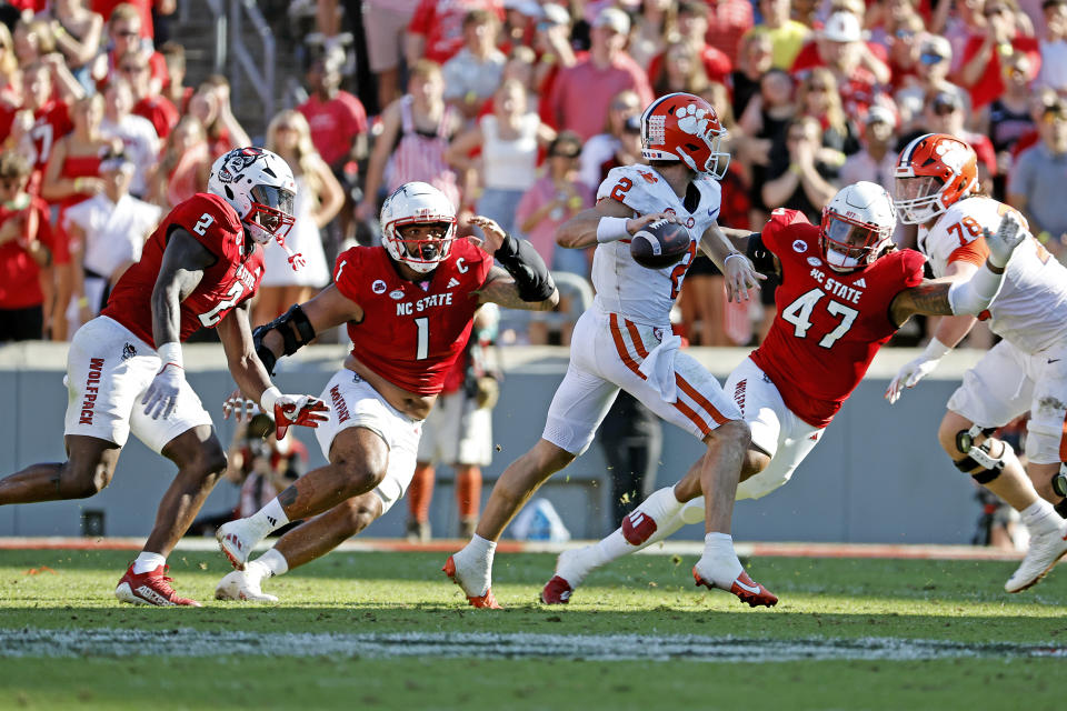 Clemson quarterback Cade Klubnik (2) passes the ball during his team's loss to North Carolina State on Saturday. (AP Photo/Karl B DeBlaker)