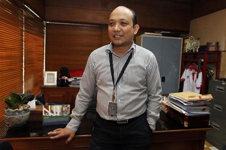 Corruption Eradication Agency (KPK) graft investigator Novel Baswedan poses in his office in Jakarta June 26, 2013. REUTERS/Enny Nuraheni