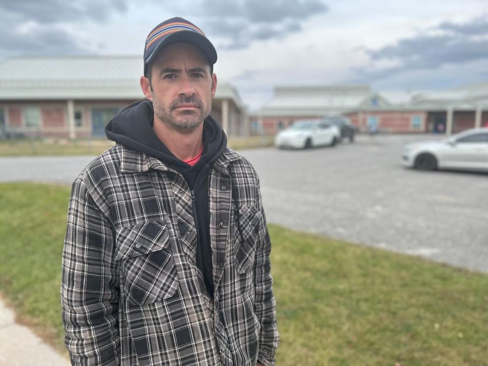 Adam Willis says he has no alternative care for his daughter who attended the before- and after-school program at Arklan Community Public School. (Robyn Miller/CBC News - image credit)