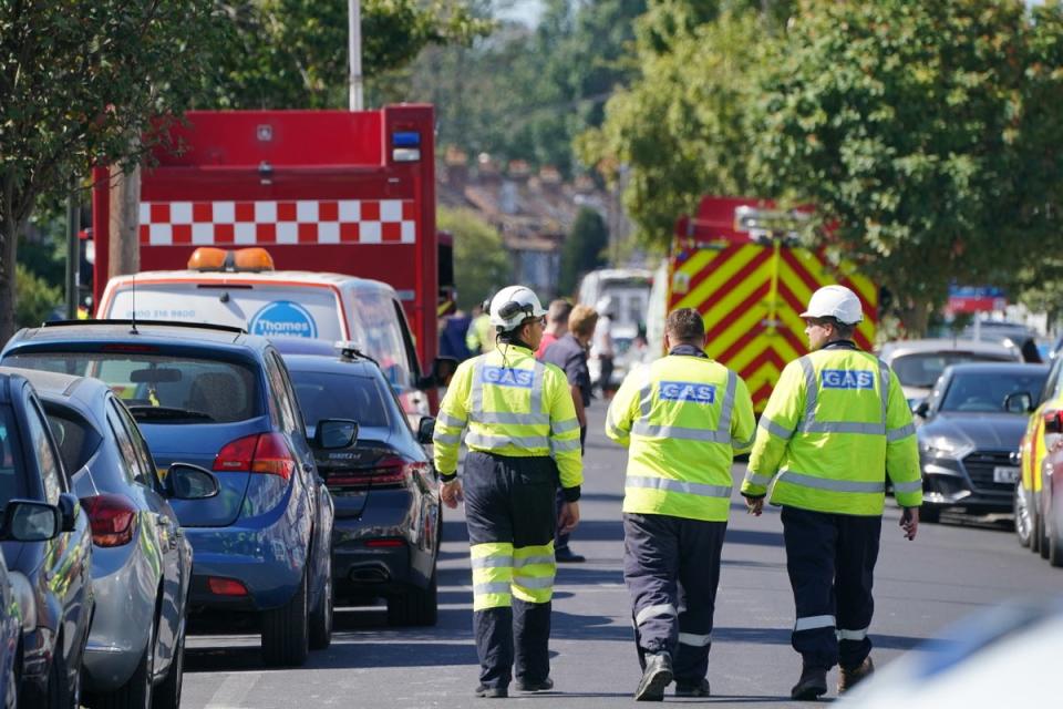 Gas staff at scene in Galpin’s Road in Thornton Heath, south London (Dominic Lipinski/PA) (PA Wire)